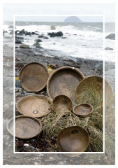 wooden bowls by the shore