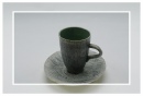 Green coffee mug and saucer